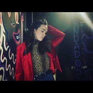 Vintage red velvet blazer size Medium.